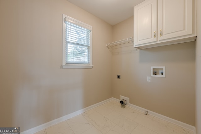 laundry room with marble finish floor, electric dryer hookup, baseboards, and washer hookup