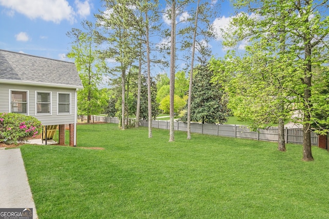 view of yard featuring fence