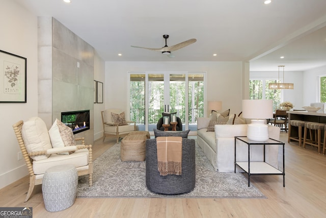 5535 Chestatee Landing Way, Gainesville, GA 30506 - living area featuring a fireplace, light wood-type flooring, ceiling fan, and recessed lighting