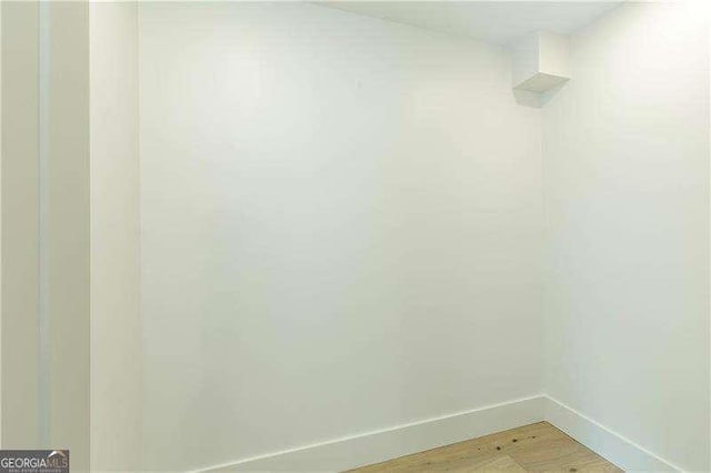 5535 Chestatee Landing Way, Gainesville, GA 30506 - spare room featuring baseboards and light wood-type flooring