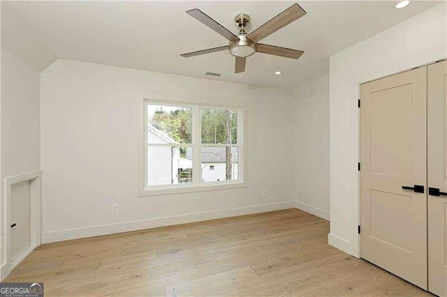 5535 Chestatee Landing Way, Gainesville, GA 30506 - unfurnished bedroom with light wood-style flooring, baseboards, recessed lighting, a closet, and a ceiling fan
