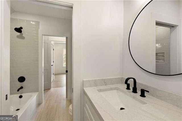 5535 Chestatee Landing Way, Gainesville, GA 30506 - bathroom with vanity, toilet, and tub / shower combination