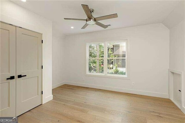 5535 Chestatee Landing Way, Gainesville, GA 30506 - unfurnished bedroom featuring light wood-style floors, baseboards, recessed lighting, a closet, and a ceiling fan