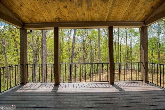 5535 Chestatee Landing Way, Gainesville, GA 30506 - unfurnished sunroom with a wooded view