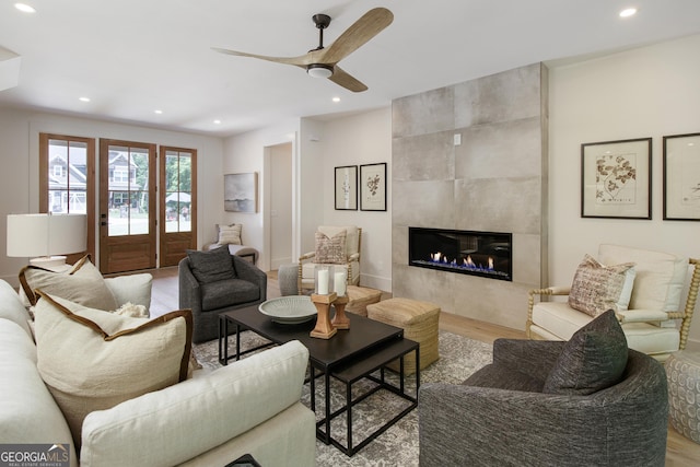 5535 Chestatee Landing Way, Gainesville, GA 30506 - living area featuring wood finished floors, a fireplace, ceiling fan, and recessed lighting