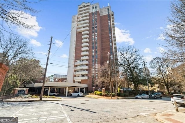 view of property with uncovered parking