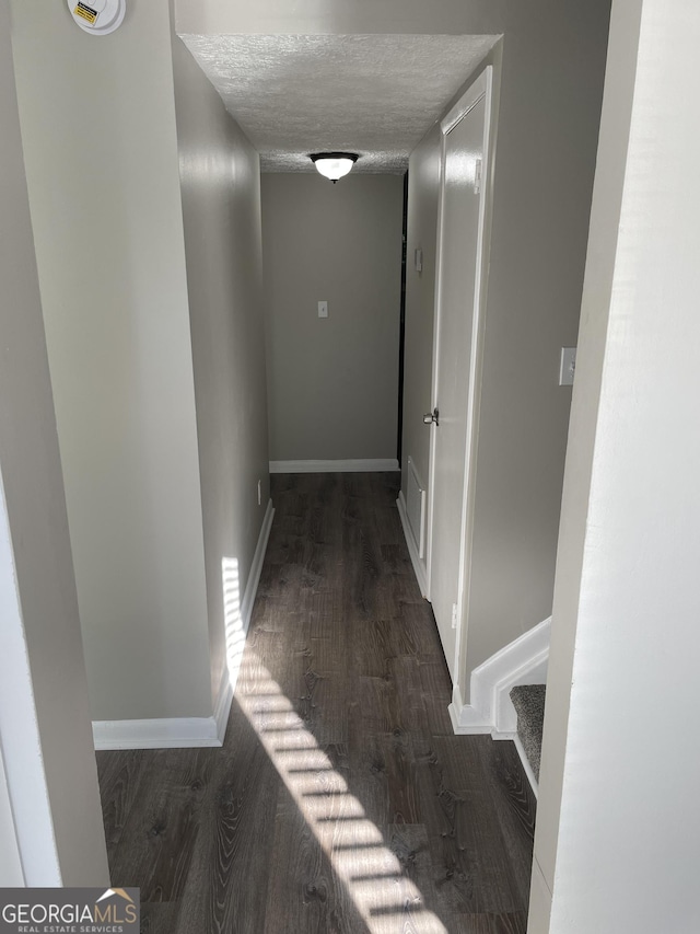 3621 Stedman Pl, Duluth, GA 30096 - hallway with wood finished floors and a textured ceiling