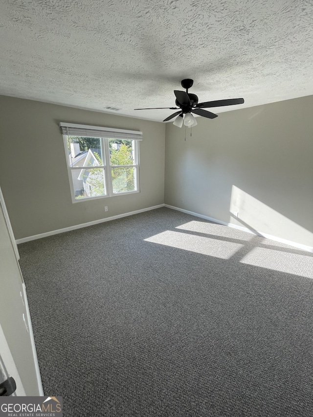 3621 Stedman Pl, Duluth, GA 30096 - carpeted spare room featuring a textured ceiling and a ceiling fan