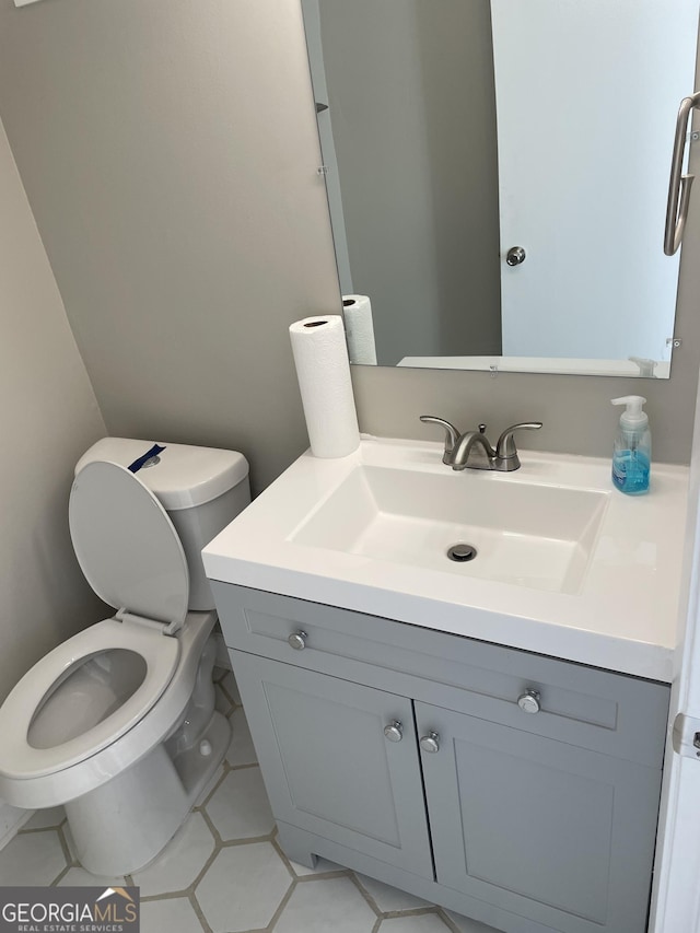3621 Stedman Pl, Duluth, GA 30096 - half bath featuring vanity and tile patterned flooring