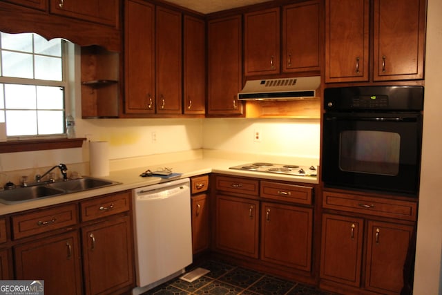 kitchen with oven, ventilation hood, a sink, electric cooktop, and white dishwasher