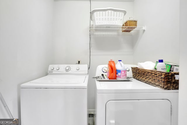 clothes washing area with laundry area and separate washer and dryer
