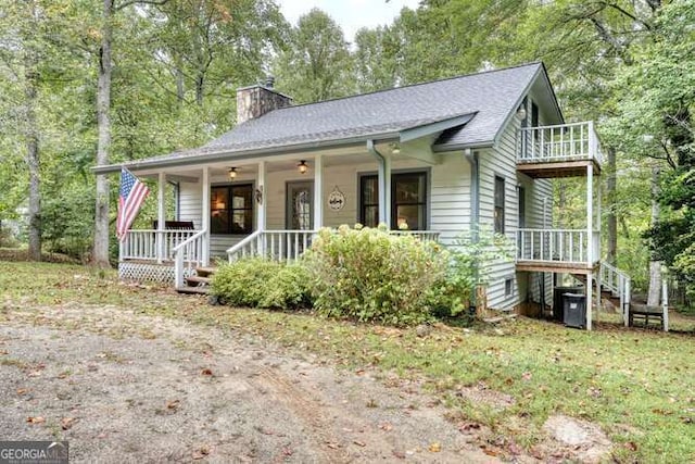 83 Smokey Creek Cv Tract B, Unit Tract B, Blairsville, GA 30512 - view of front of house with a porch, a chimney, stairs, and a balcony