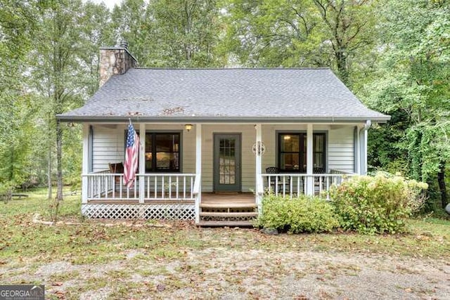 83 Smokey Creek Cv Tract B, Unit Tract B, Blairsville, GA 30512 - view of front of home with a chimney and a porch