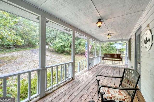 83 Smokey Creek Cv Tract B, Unit Tract B, Blairsville, GA 30512 - wooden terrace featuring covered porch