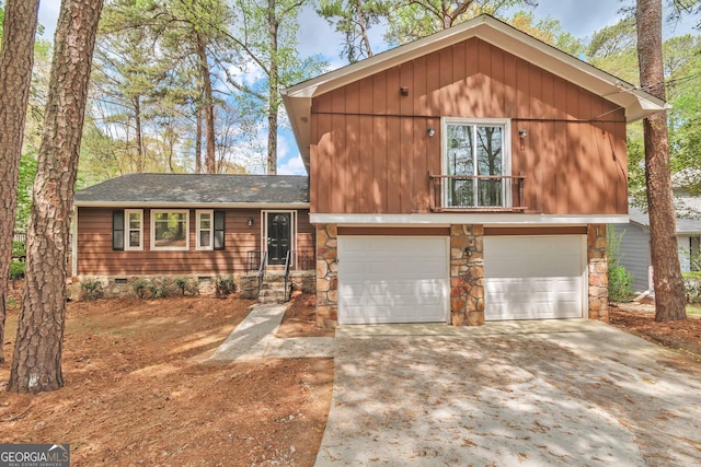 5350 Rockbridge Rd, Stone Mountain, GA 30088 - view of front of home featuring concrete driveway, crawl space, stone siding, a garage, and a shingled roof