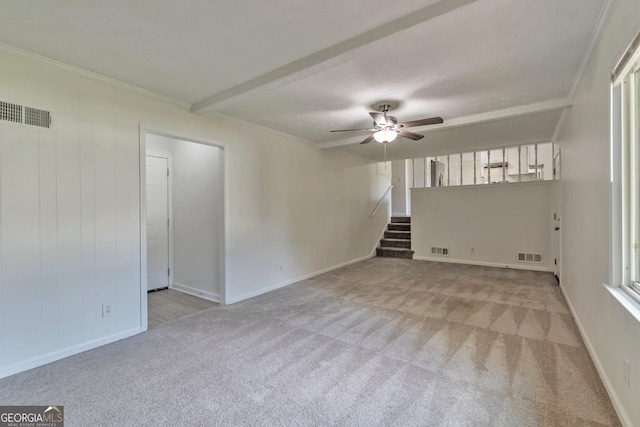 5350 Rockbridge Rd, Stone Mountain, GA 30088 - unfurnished living room with stairs, visible vents, a ceiling fan, and carpet floors