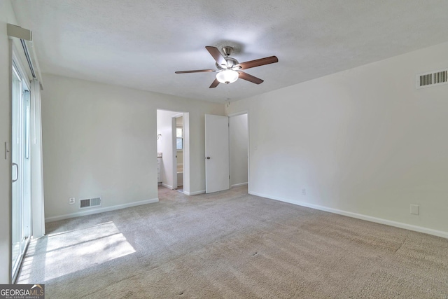 5350 Rockbridge Rd, Stone Mountain, GA 30088 - unfurnished bedroom with a ceiling fan, baseboards, carpet, and visible vents