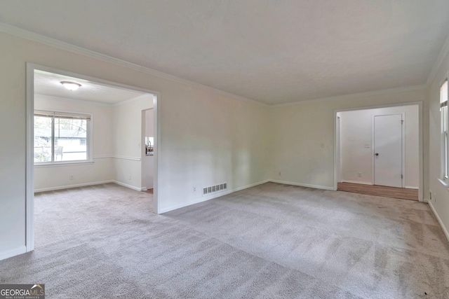 5350 Rockbridge Rd, Stone Mountain, GA 30088 - spare room featuring carpet flooring, visible vents, and baseboards