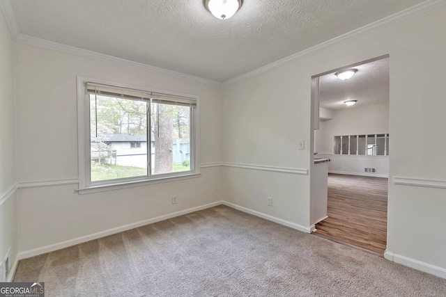 5350 Rockbridge Rd, Stone Mountain, GA 30088 - carpeted empty room featuring visible vents, baseboards, and crown molding