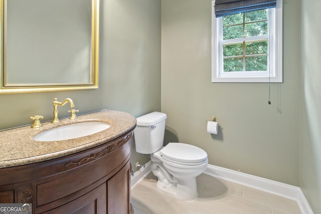 532 Zellner Rd, Forsyth, GA 31029 - bathroom with toilet, vanity, baseboards, and tile patterned floors