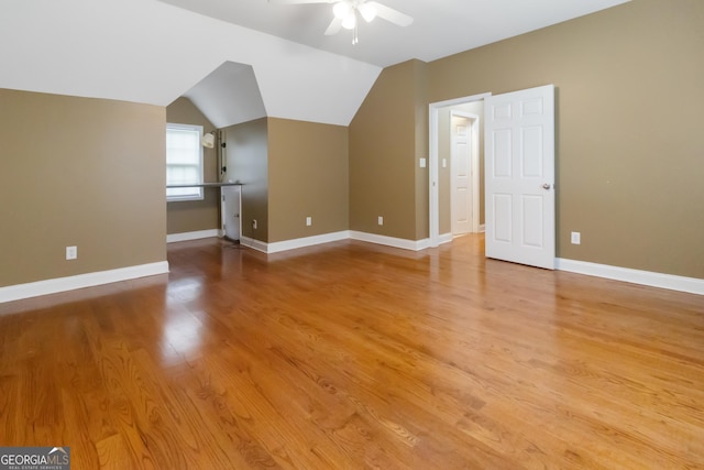 532 Zellner Rd, Forsyth, GA 31029 - additional living space with light wood-style floors, baseboards, ceiling fan, and lofted ceiling