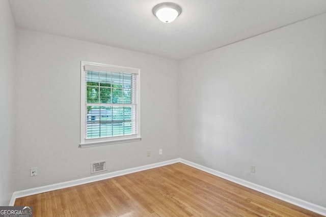 2732 Elkhorn Dr, Decatur, GA 30034 - empty room featuring baseboards, visible vents, and wood finished floors