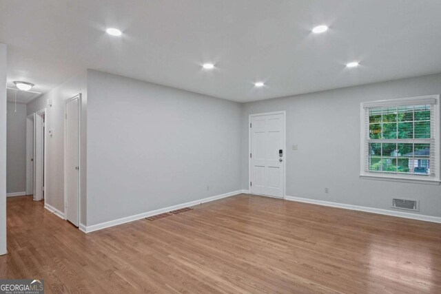 2732 Elkhorn Dr, Decatur, GA 30034 - spare room with visible vents, attic access, light wood-style floors, and recessed lighting