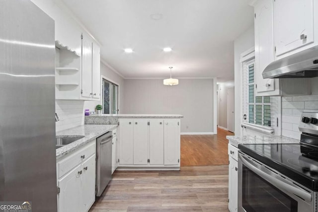 2732 Elkhorn Dr, Decatur, GA 30034 - kitchen with white cabinetry, stainless steel appliances, a peninsula, and under cabinet range hood