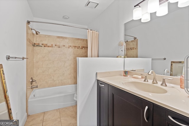 full bath featuring vanity, tile patterned flooring, shower / tub combo with curtain, toilet, and visible vents