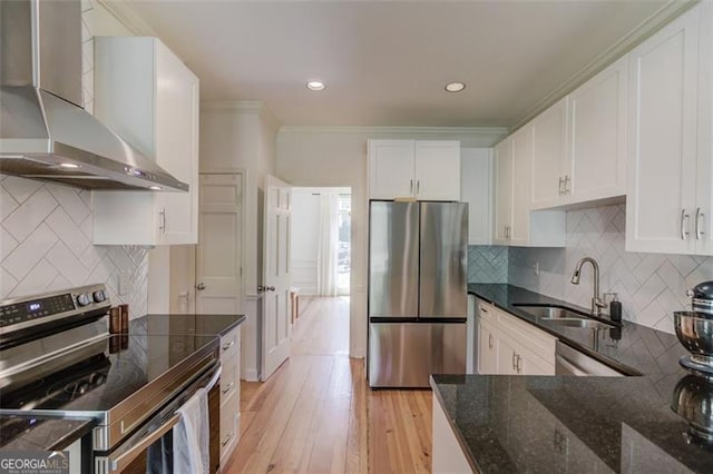 1038 Huntcliff, Atlanta, GA 30350 - kitchen with wall chimney exhaust hood, a sink, white cabinetry, and appliances with stainless steel finishes