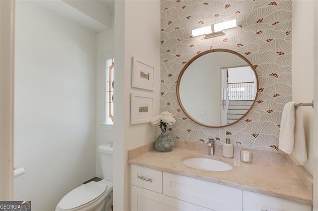 1038 Huntcliff, Atlanta, GA 30350 - half bath with vanity, wallpapered walls, and toilet