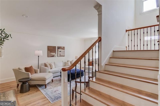 1038 Huntcliff, Atlanta, GA 30350 - stairway featuring baseboards and wood finished floors