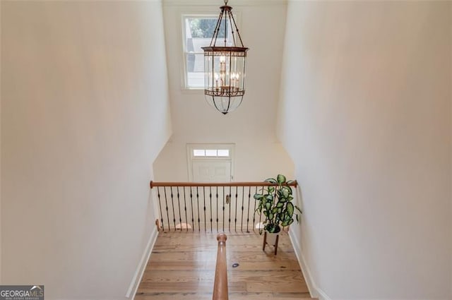 1038 Huntcliff, Atlanta, GA 30350 - interior space with a chandelier, wood finished floors, and a wealth of natural light