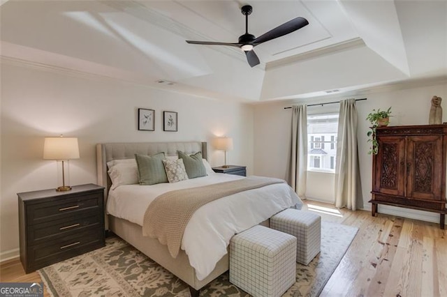 1038 Huntcliff, Atlanta, GA 30350 - bedroom with light wood finished floors, crown molding, and a raised ceiling