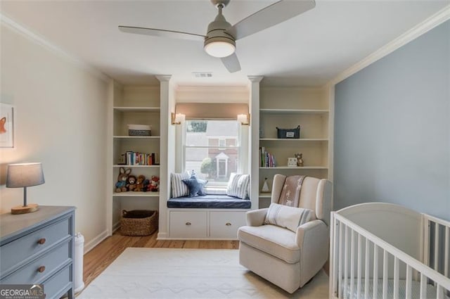 1038 Huntcliff, Atlanta, GA 30350 - bedroom featuring light wood-type flooring, decorative columns, ornamental molding, and visible vents
