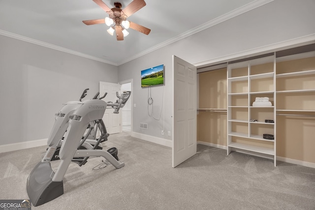 workout room with ceiling fan, ornamental molding, visible vents, carpet flooring, and baseboards