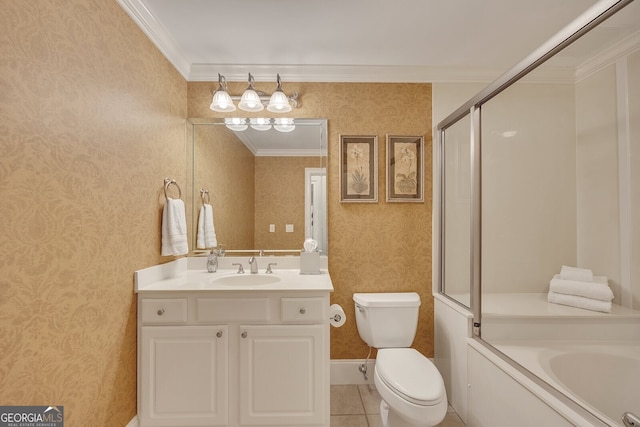 bathroom featuring vanity, ornamental molding, wallpapered walls, a bathing tub, and toilet