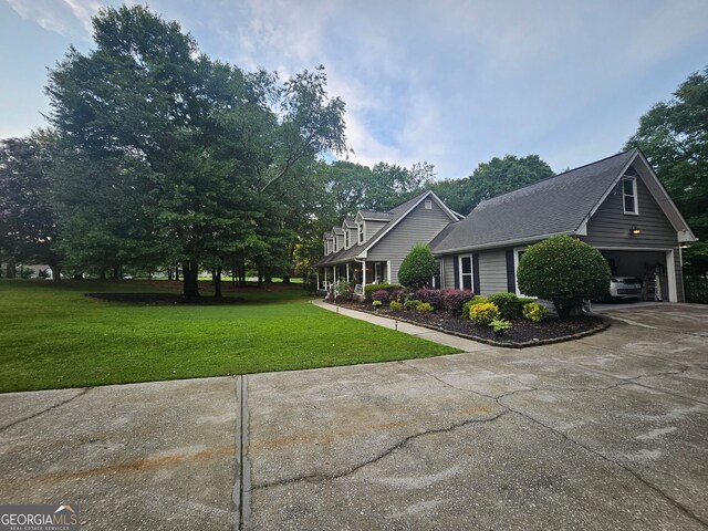 3650 Bay Leaf Dr, Loganville, GA 30052 - view of front facade with a front lawn, a garage, and driveway
