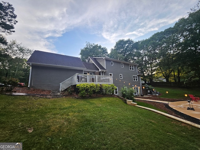 3650 Bay Leaf Dr, Loganville, GA 30052 - back of property featuring a wooden deck and stairs