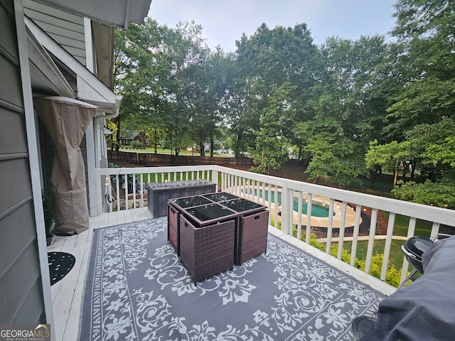 3650 Bay Leaf Dr, Loganville, GA 30052 - deck featuring a fenced backyard and view of wooded area