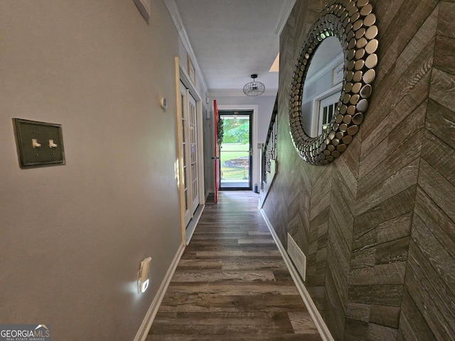 3650 Bay Leaf Dr, Loganville, GA 30052 - hallway with ornamental molding and dark wood-type flooring