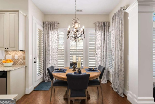 2358 New Salem Trce, Marietta, GA 30064 - dining space featuring dark wood-type flooring, a chandelier, and baseboards