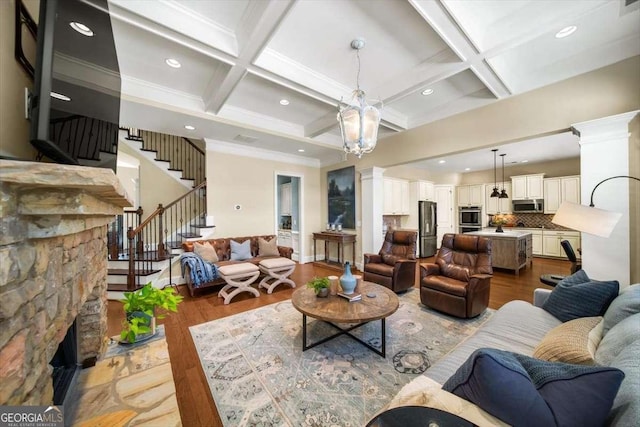 2358 New Salem Trce, Marietta, GA 30064 - living room with coffered ceiling, light wood finished floors, stairway, beam ceiling, and recessed lighting
