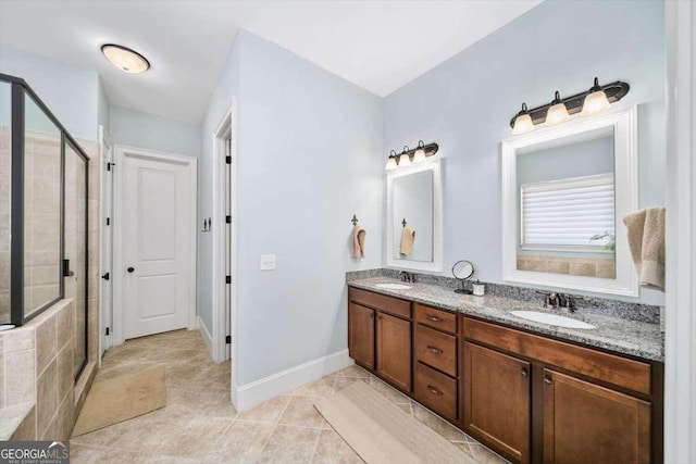 2358 New Salem Trce, Marietta, GA 30064 - bathroom featuring a stall shower, double vanity, tile patterned flooring, and baseboards