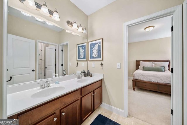 2358 New Salem Trce, Marietta, GA 30064 - ensuite bathroom featuring tile patterned flooring, double vanity, and baseboards