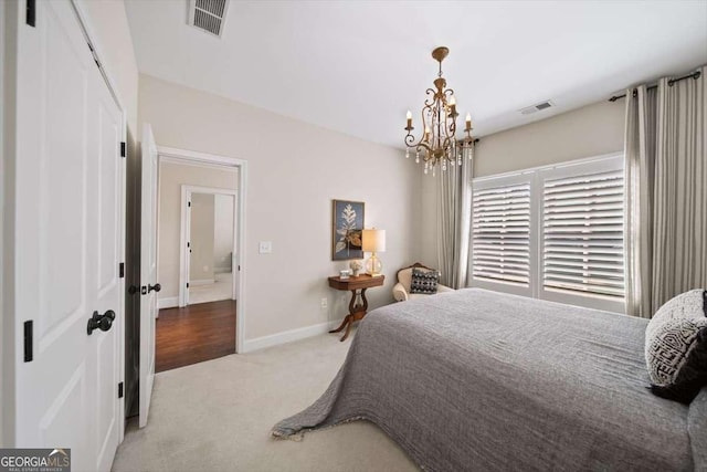 2358 New Salem Trce, Marietta, GA 30064 - bedroom with a chandelier, carpet flooring, a closet, and baseboards