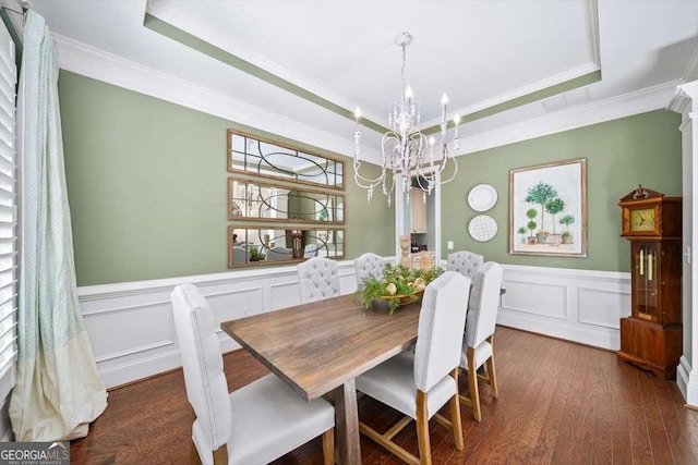 2358 New Salem Trce, Marietta, GA 30064 - dining room with a tray ceiling, a chandelier, crown molding, a wainscoted wall, and wood finished floors