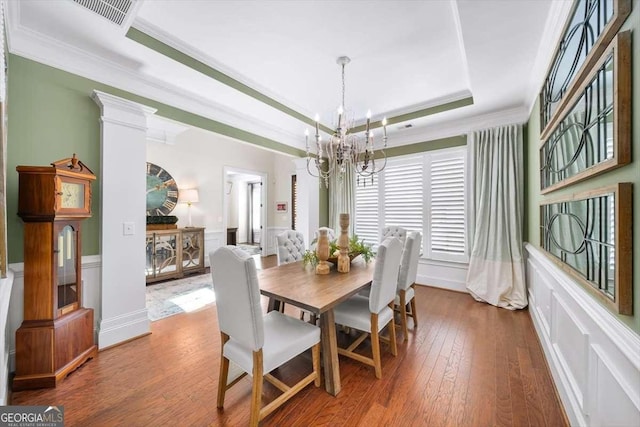 2358 New Salem Trce, Marietta, GA 30064 - dining space with a chandelier, a raised ceiling, crown molding, and wood-type flooring