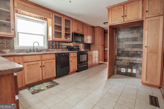 724 Ga Highway 120, Tallapoosa, GA 30176 - kitchen featuring black appliances, decorative backsplash, light tile patterned flooring, and glass insert cabinets