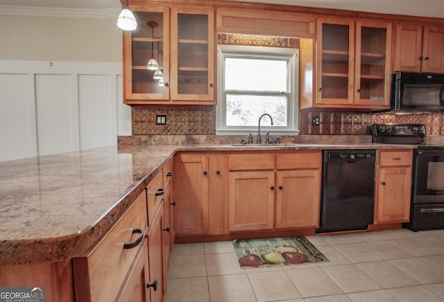 724 Ga Highway 120, Tallapoosa, GA 30176 - kitchen with black appliances, ornamental molding, a peninsula, decorative backsplash, and light stone counters